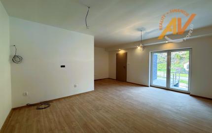 NOVOSTAVBA 4-izbový byt s veľkou záhradou a s parkovacím miestom