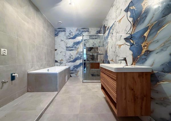 NOVOSTAVBA 4-izbový byt s vlastnou záhradou a s parkovaním