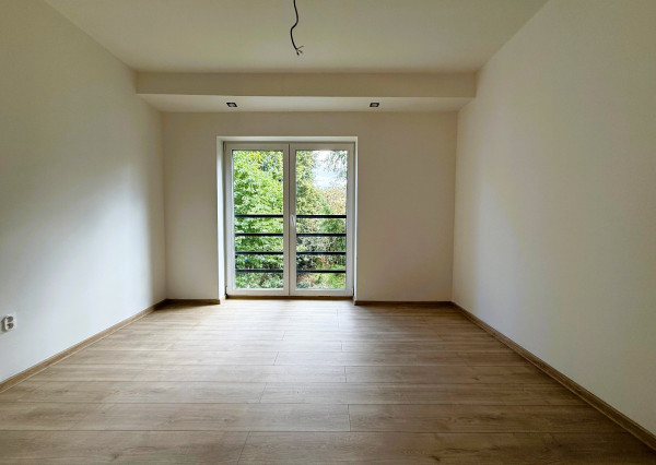 NOVOSTAVBA 4-izbový byt s veľkou záhradou a s parkovacím miestom